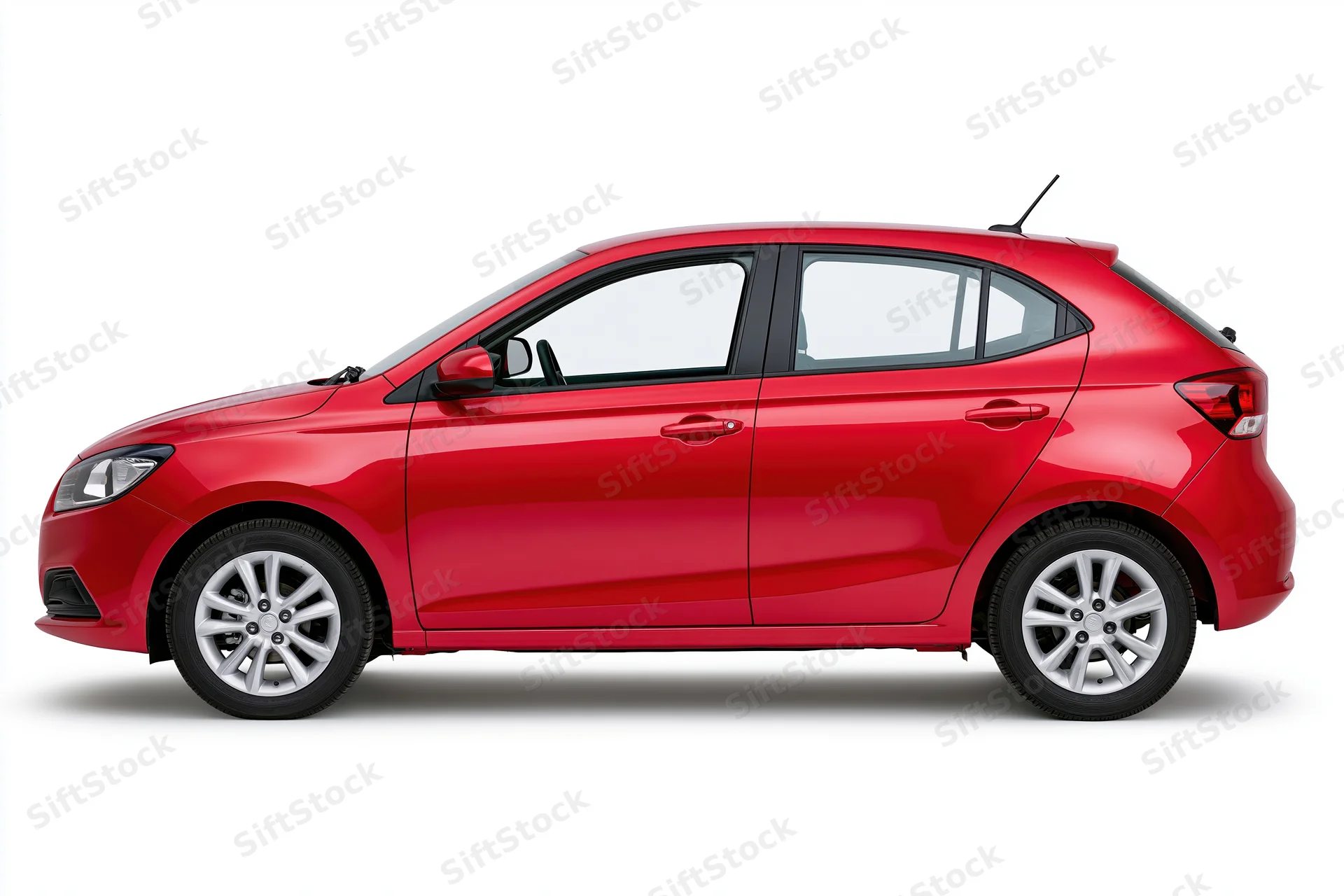 Red compact hatchback car in clean side profile view on white background