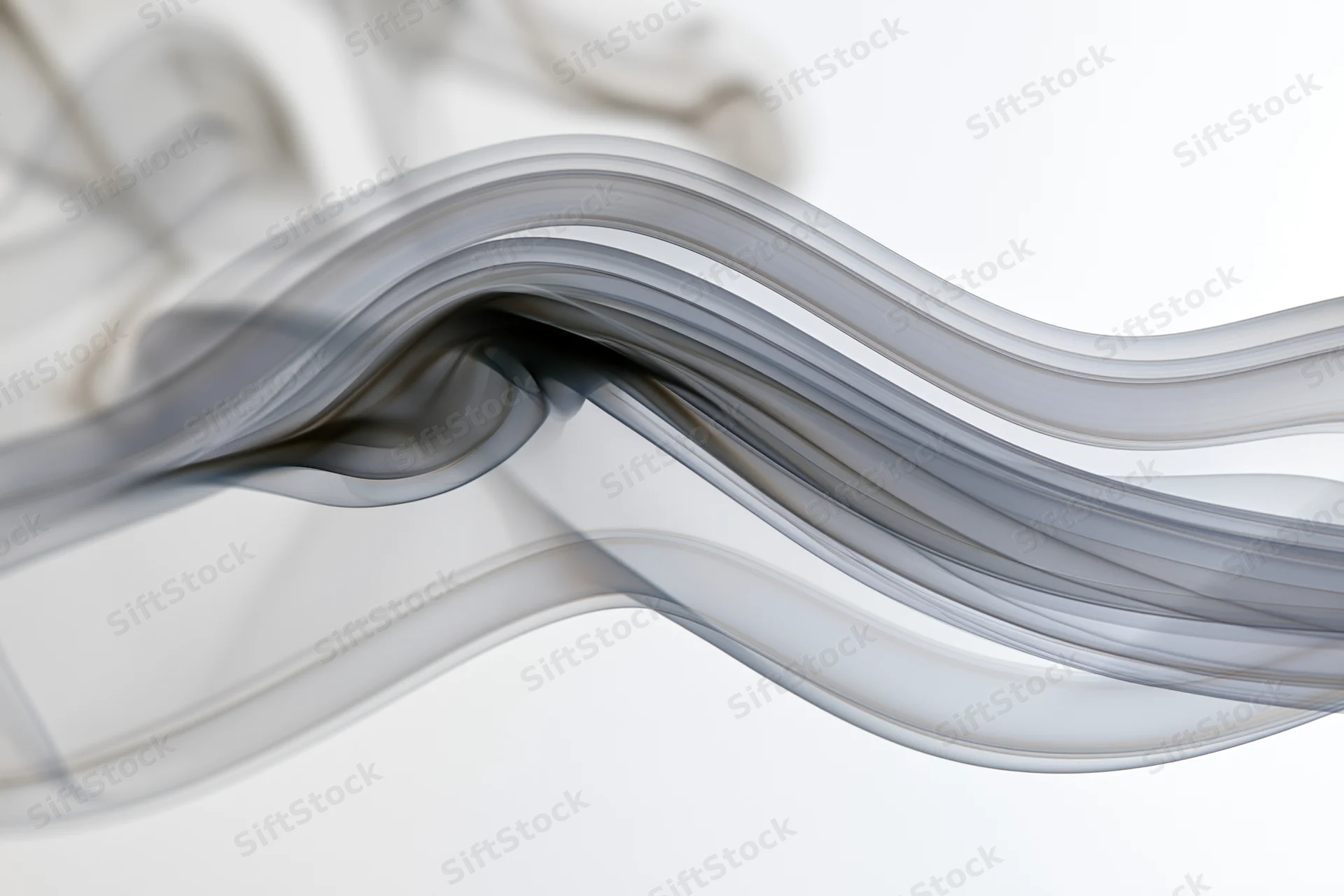 Dark smoke wisps flowing in slow motion against a white background