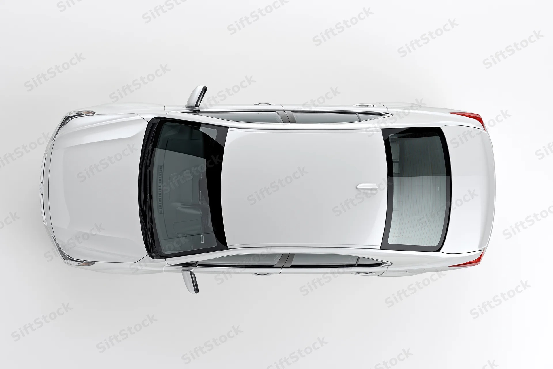White sedan viewed from directly above against a plain white background