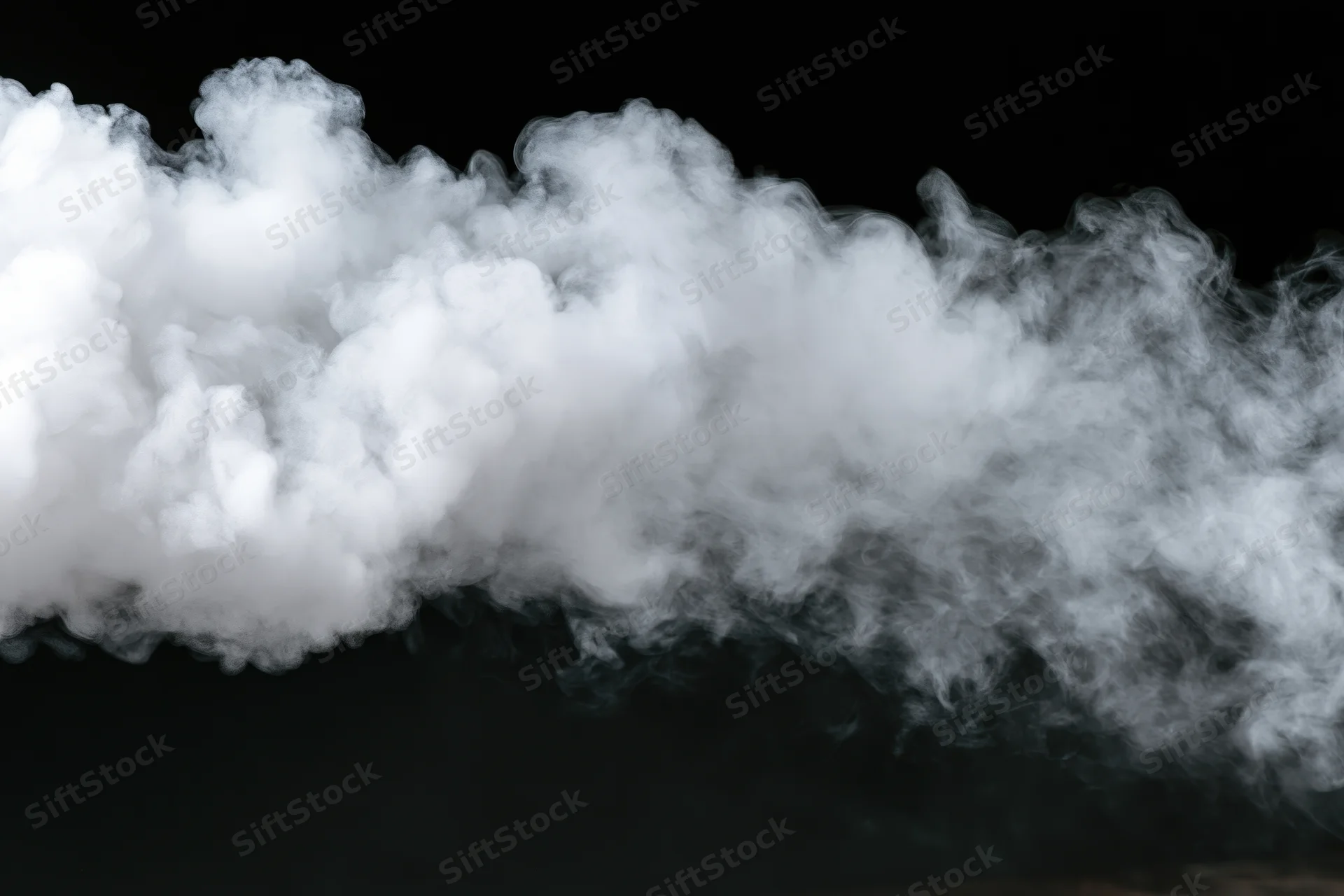 White smoke drifting horizontally across black background