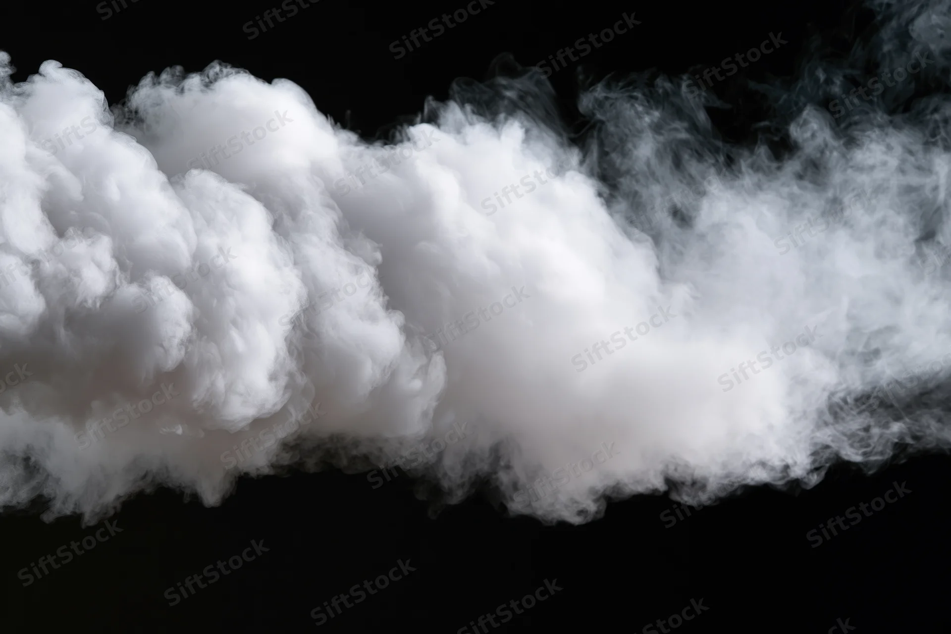 White smoke drifting horizontally across black background
