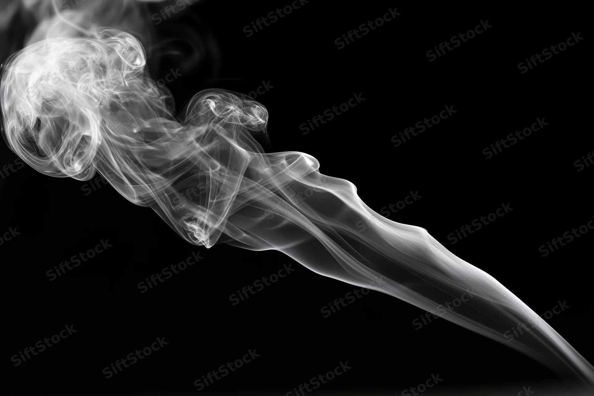 Wispy white smoke curling and dissipating upward against a pure black background