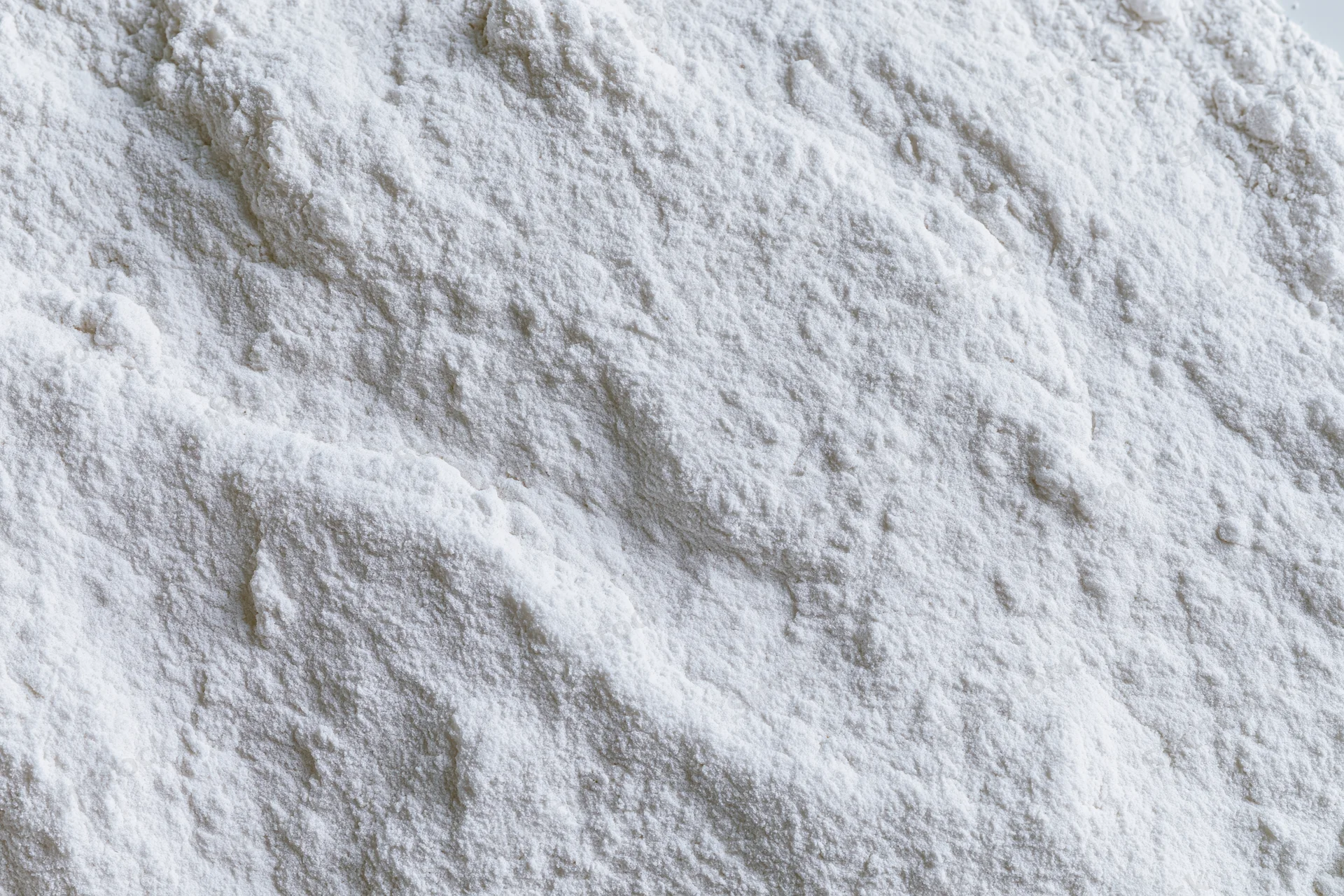 Closeup of white powder texture showing fine granular surface