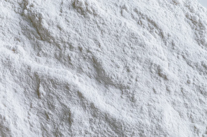 Closeup of white powder texture showing fine granular surface