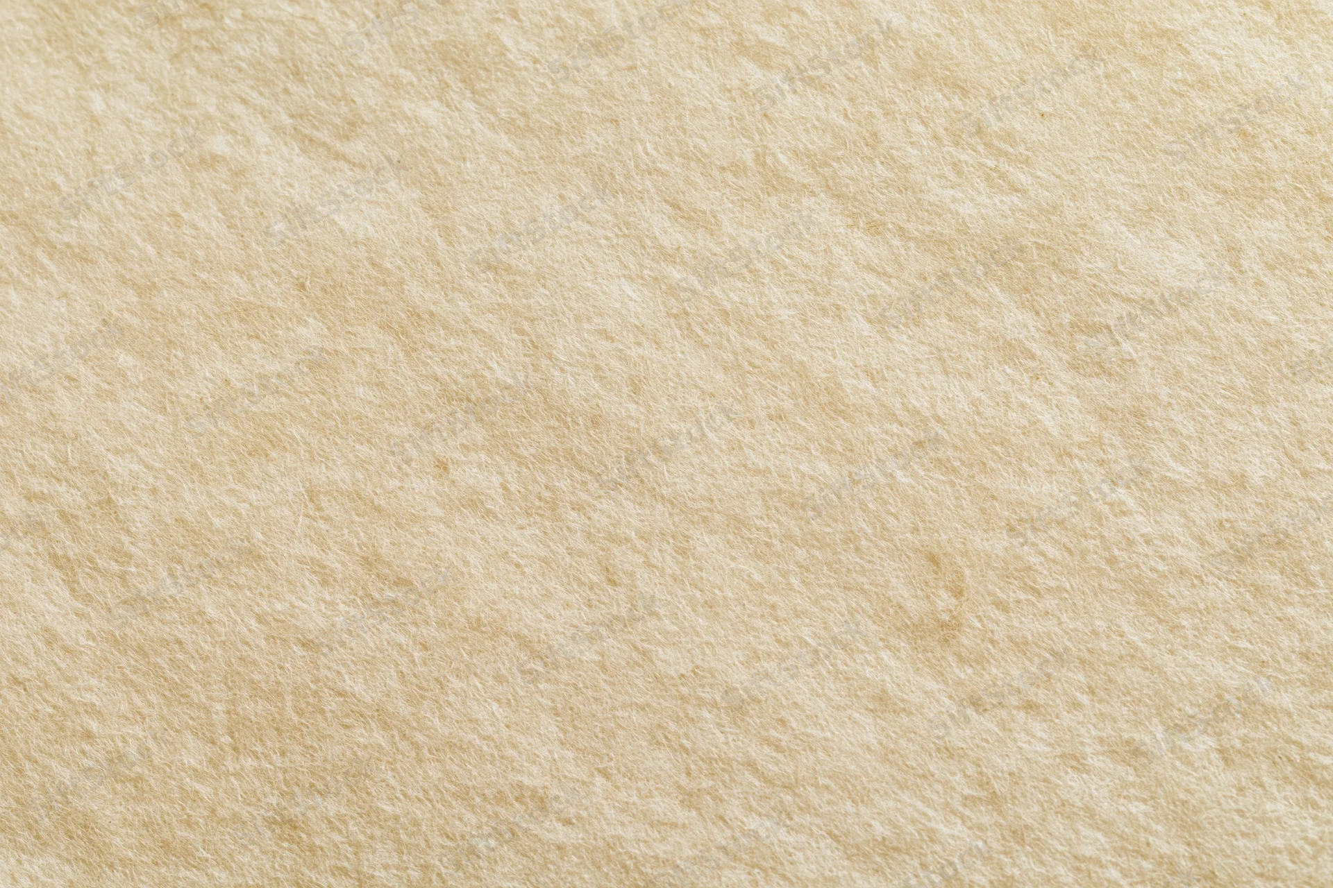 Textured beige paper surface filling the frame
