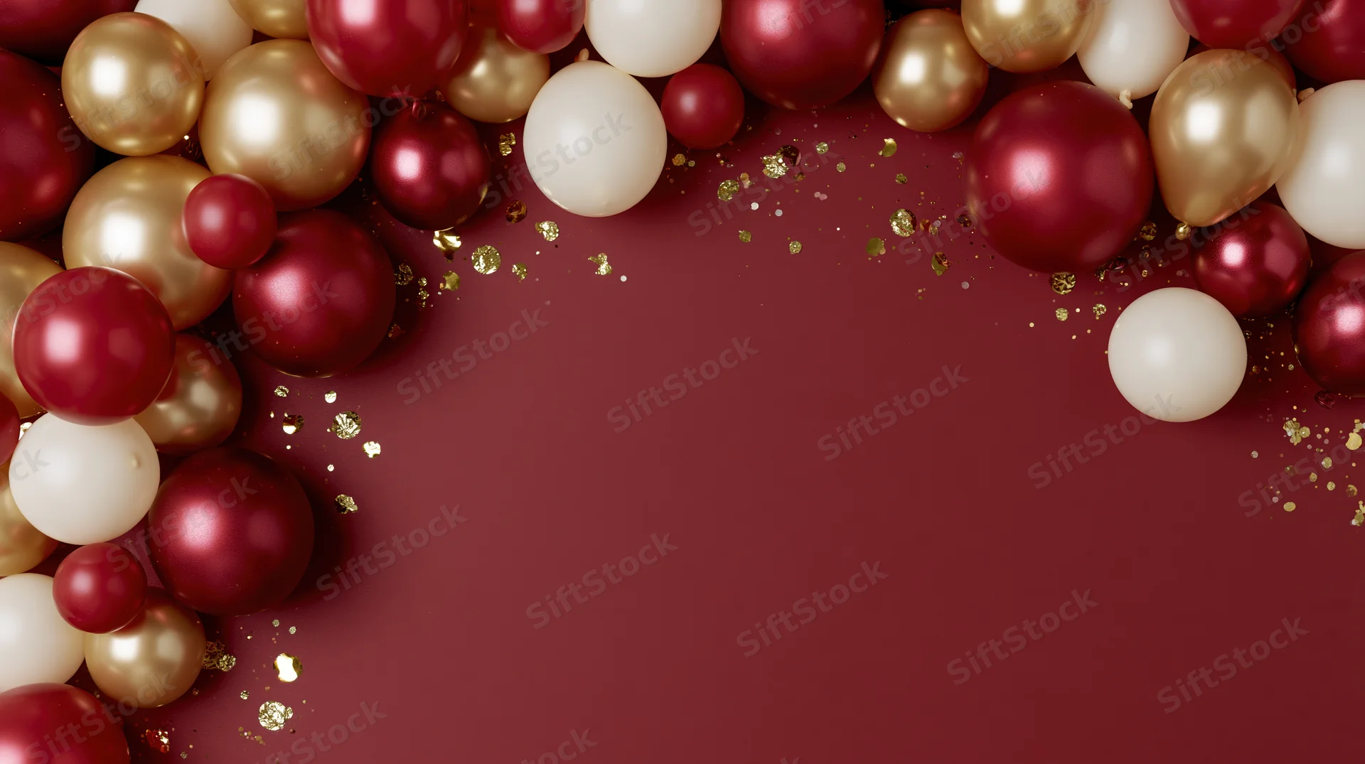Red gold and white balloons arranged in a festive frame on a deep red surface with glitter confetti and copyspace