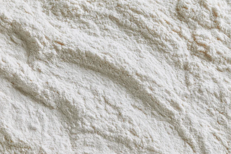 Closeup of white flour powder texture filling the frame