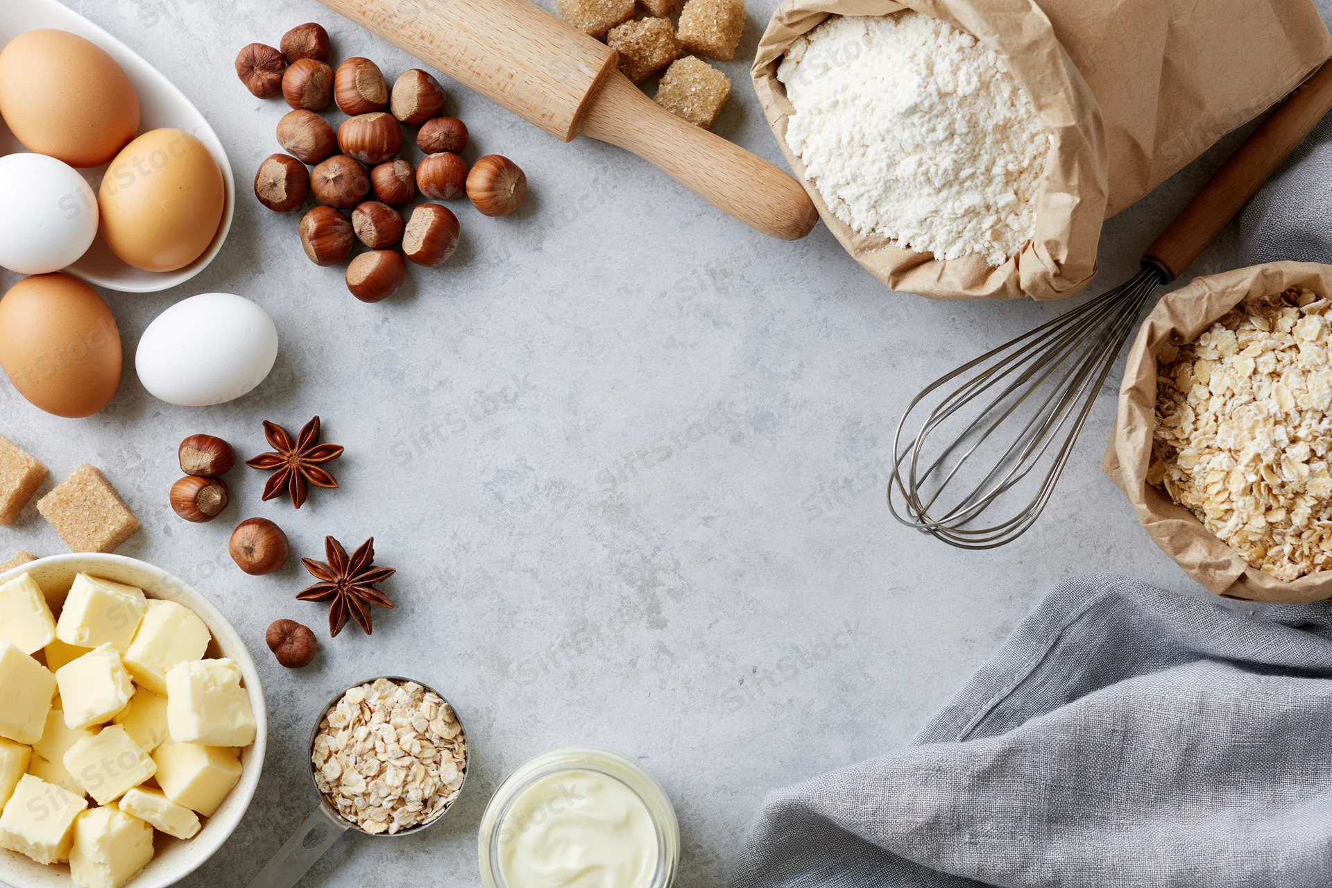 Baking ingredients arranged on a countertop with copyspace