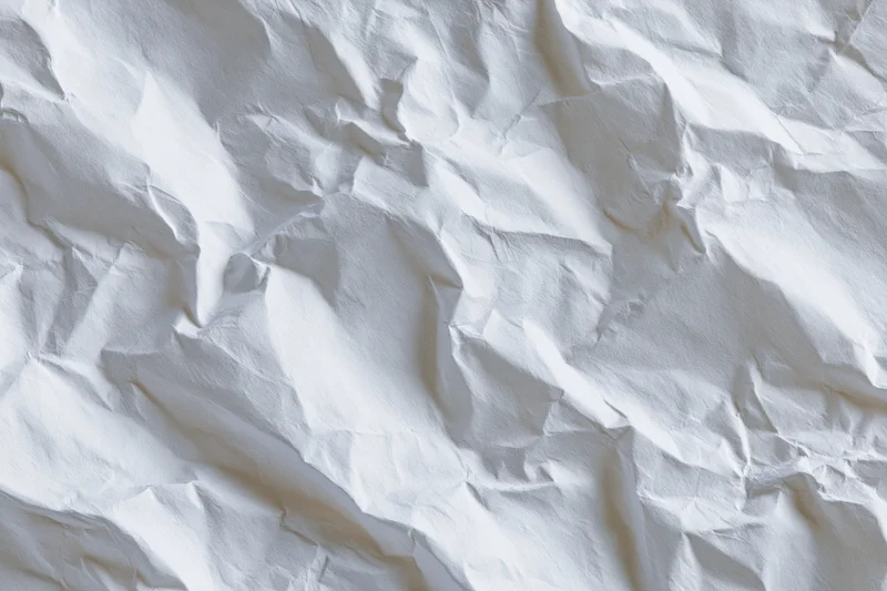 Crumpled white paper texture filling the frame