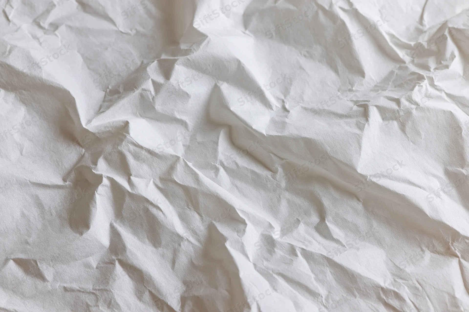 Crumpled white paper texture filling the frame
