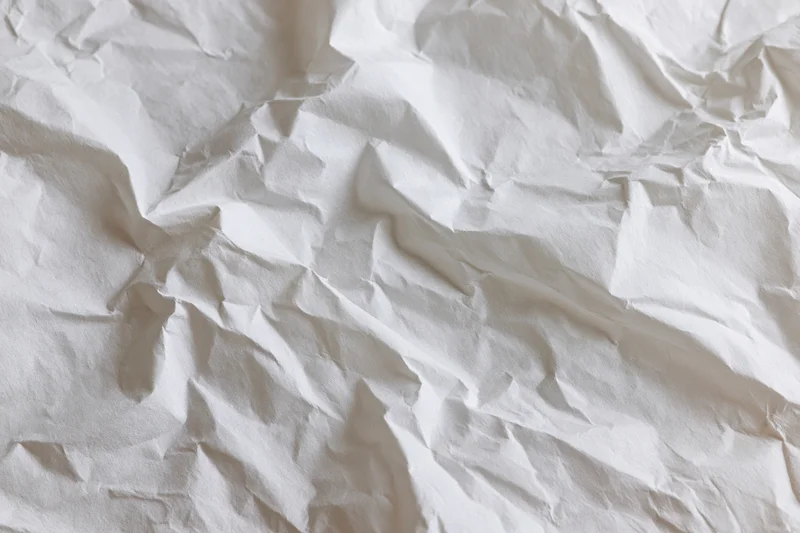 Crumpled white paper texture filling the frame