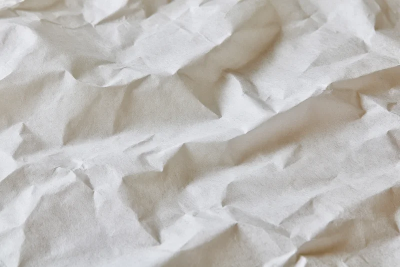 Crumpled white paper texture filling the frame