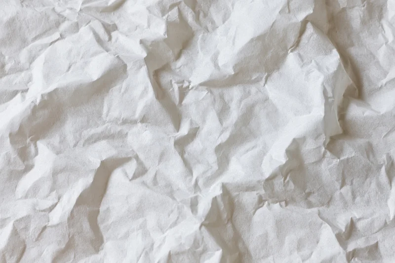 Crumpled white paper texture filling the frame