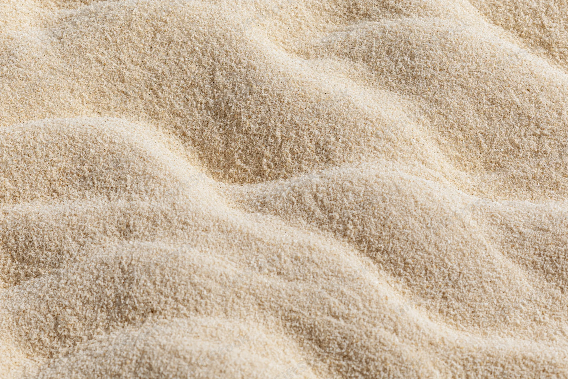 Closeup of beige plush carpet with undulating texture and soft shadows