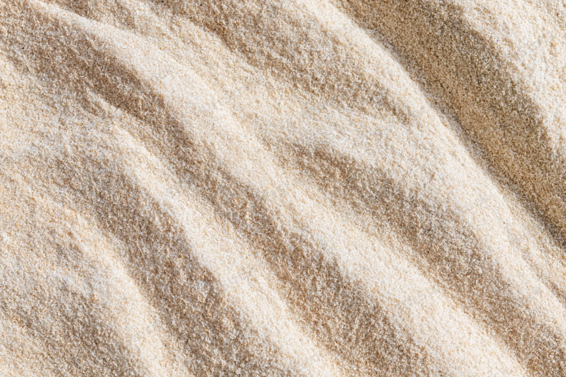 Closeup of beige wool fabric texture with soft fibers and natural weave pattern