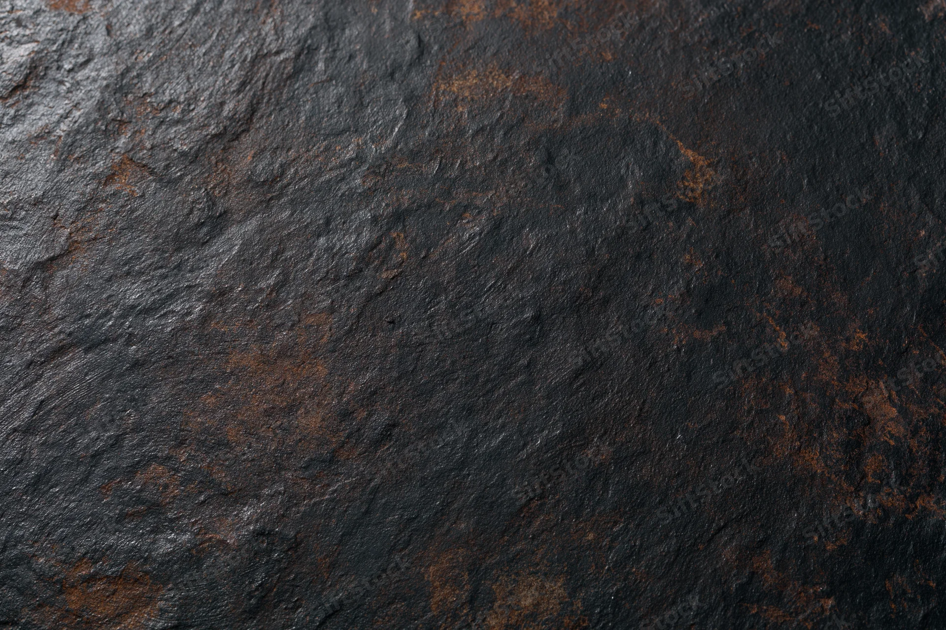 Close-up of rusted metal surface showing weathered texture and corrosion patterns