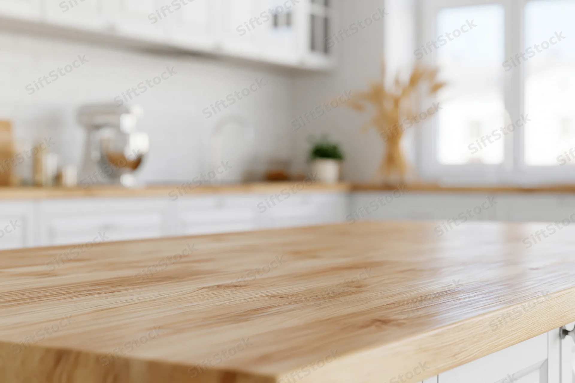 Bamboo countertop in a bright modern kitchen with white cabinetry and natural light