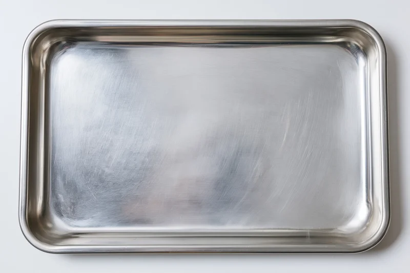Rectangular metal baking tray on white background