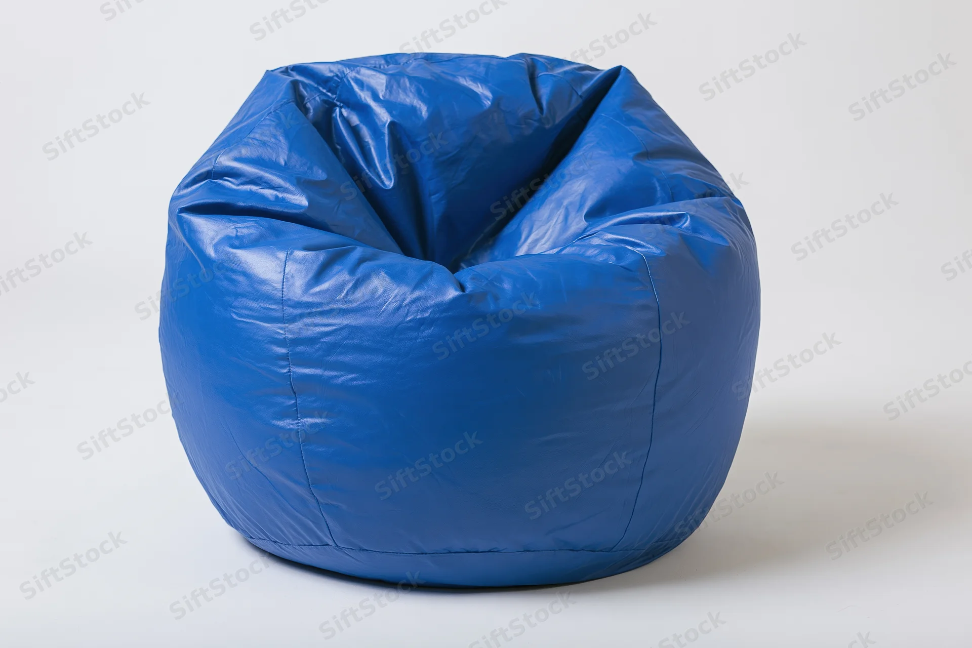 Blue vinyl bean bag chair sitting upright on plain white background
