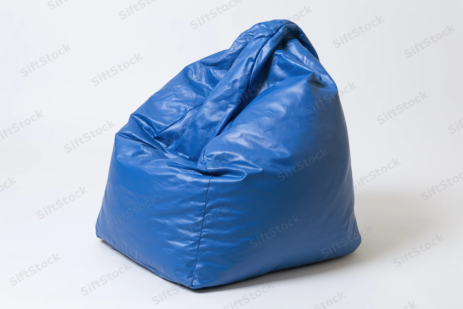 Blue vinyl bean bag chair sitting upright on plain white background