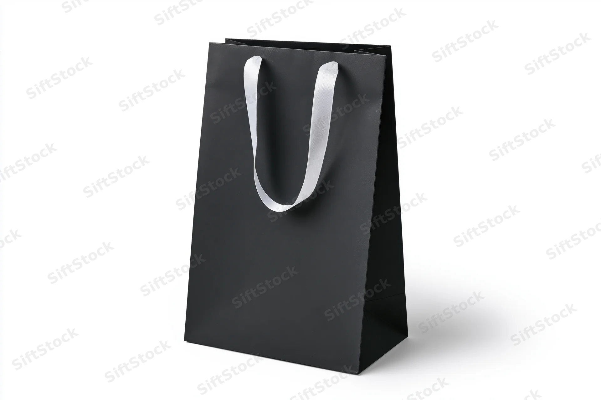 Matte black paper shopping bag with white ribbon handles on white background