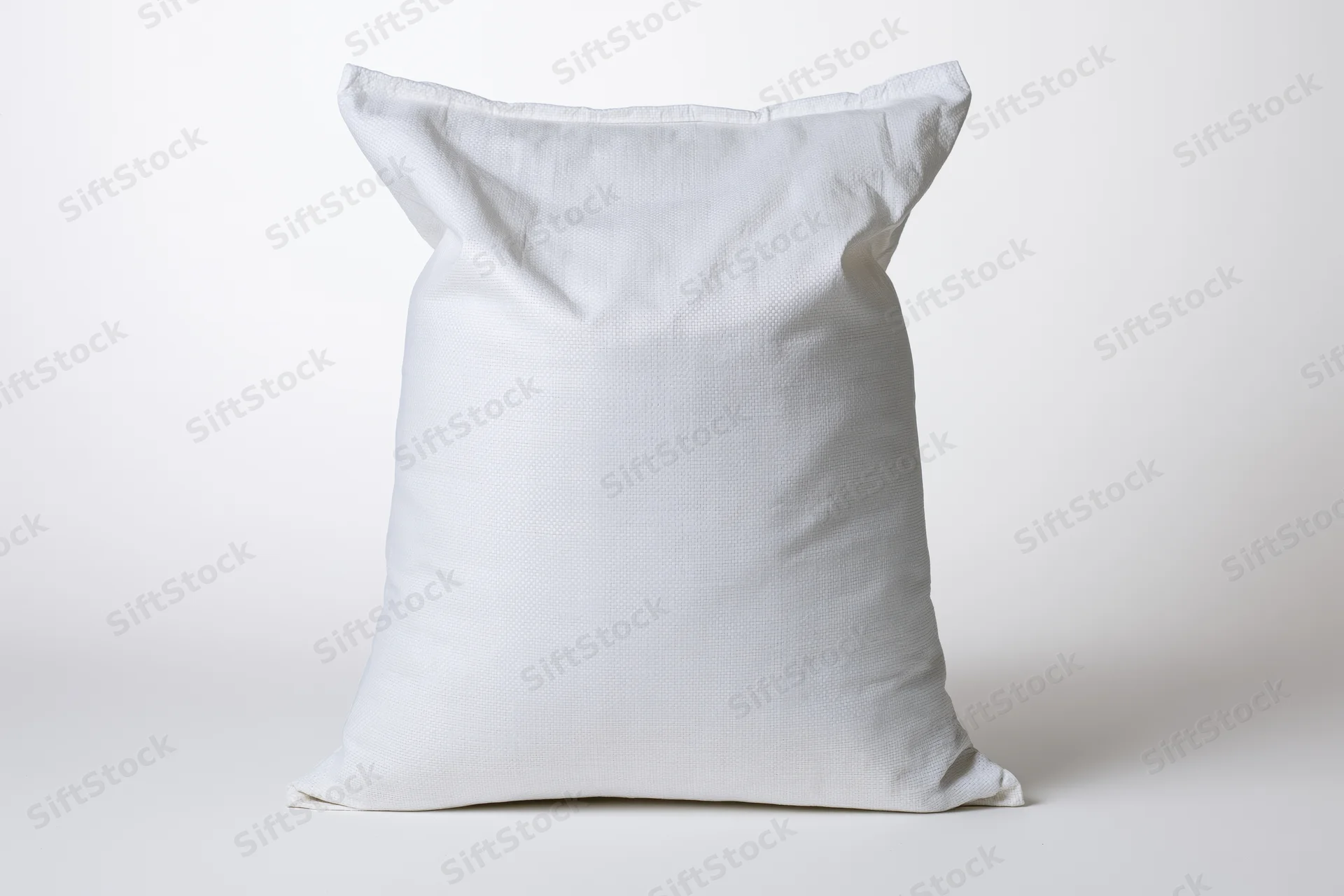 White woven polypropylene sack standing upright on plain background