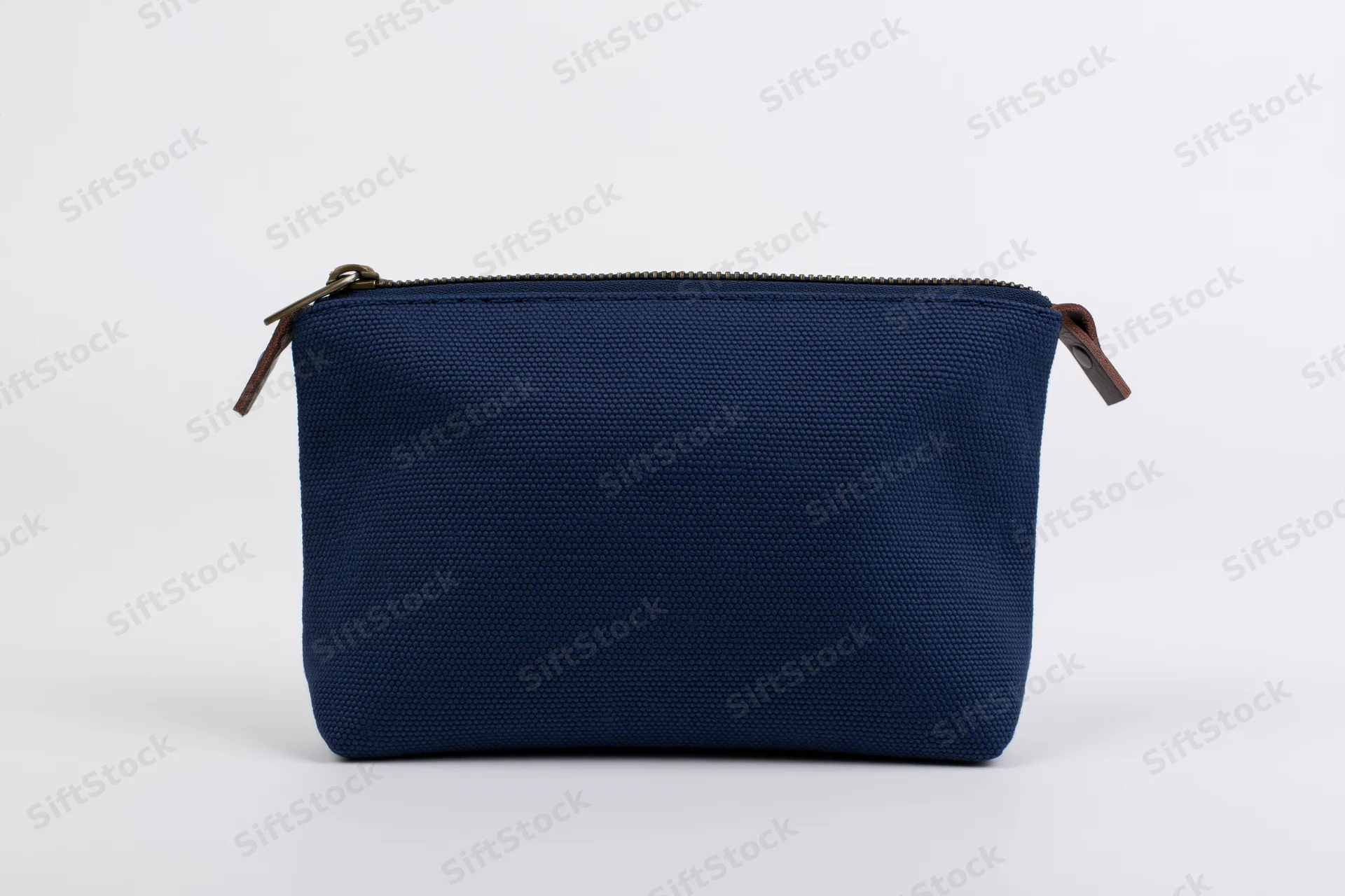 Navy canvas cosmetic pouch with top zipper on white background