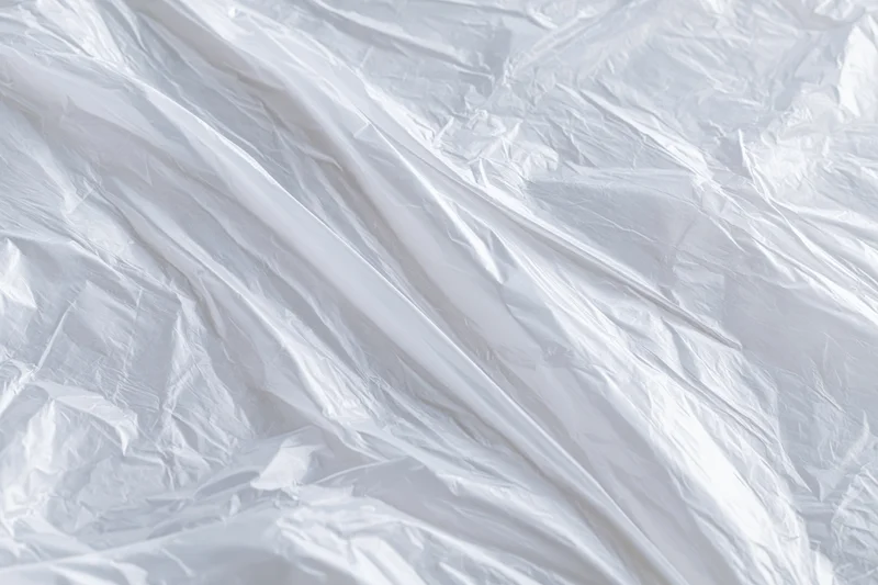 Crumpled transparent plastic wrap filling the frame as a textured surface