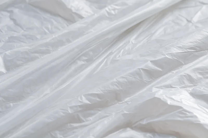 Crumpled transparent plastic wrap filling the frame as a textured surface