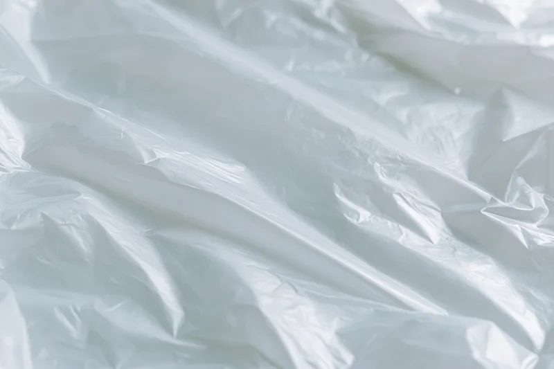 Crumpled transparent plastic wrap filling the frame as a textured surface