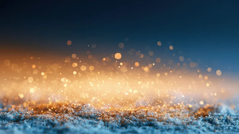 Abstract bokeh background with floating golden light particles on a blue surface