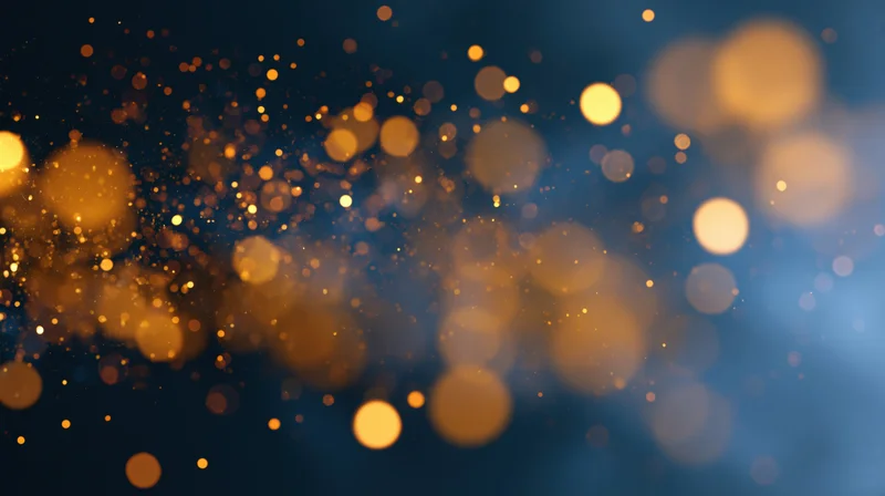 Abstract bokeh background with scattered gold and warm amber lights on dark blue gradient