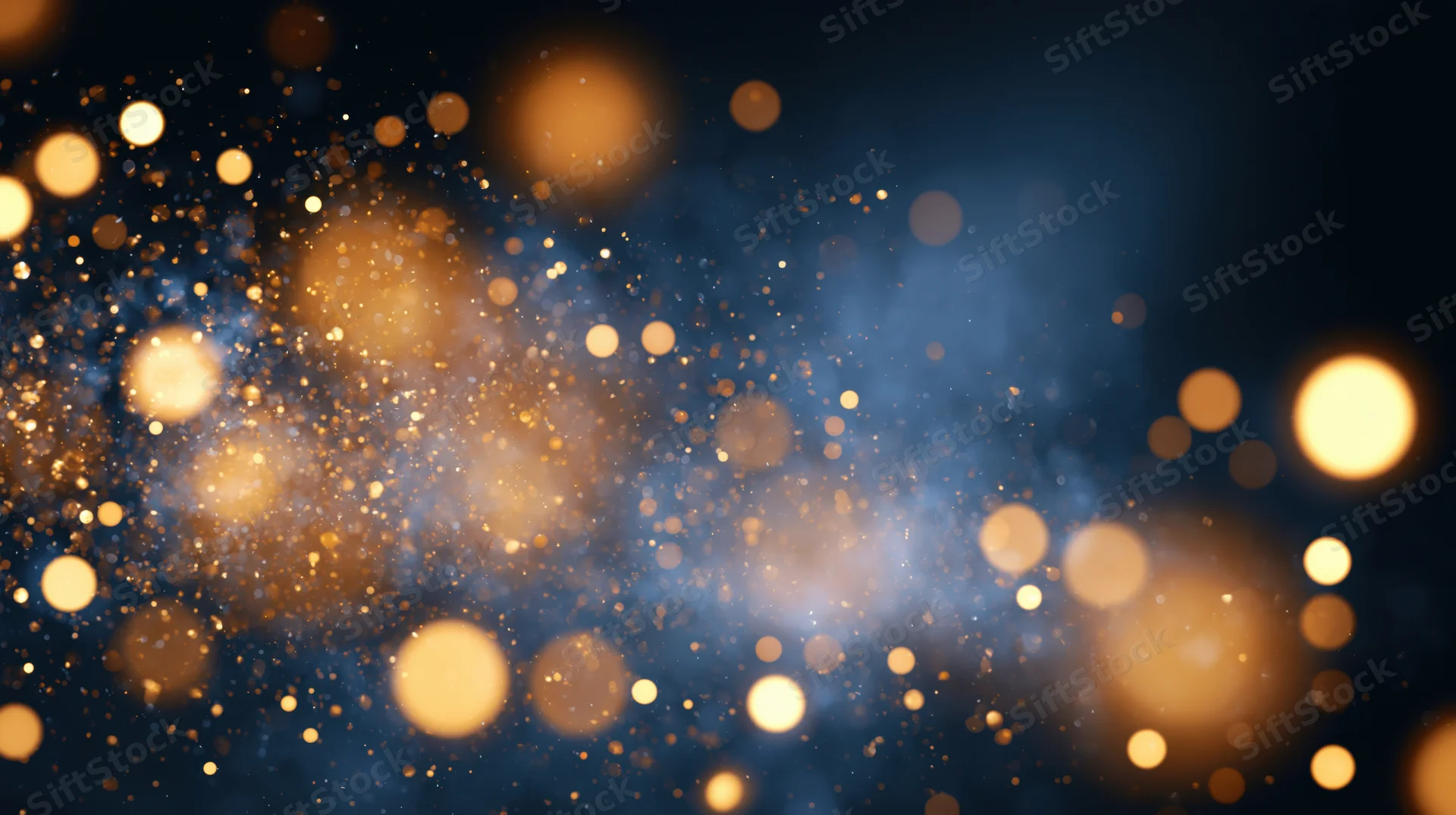 Abstract bokeh background with scattered gold and warm amber lights on dark blue