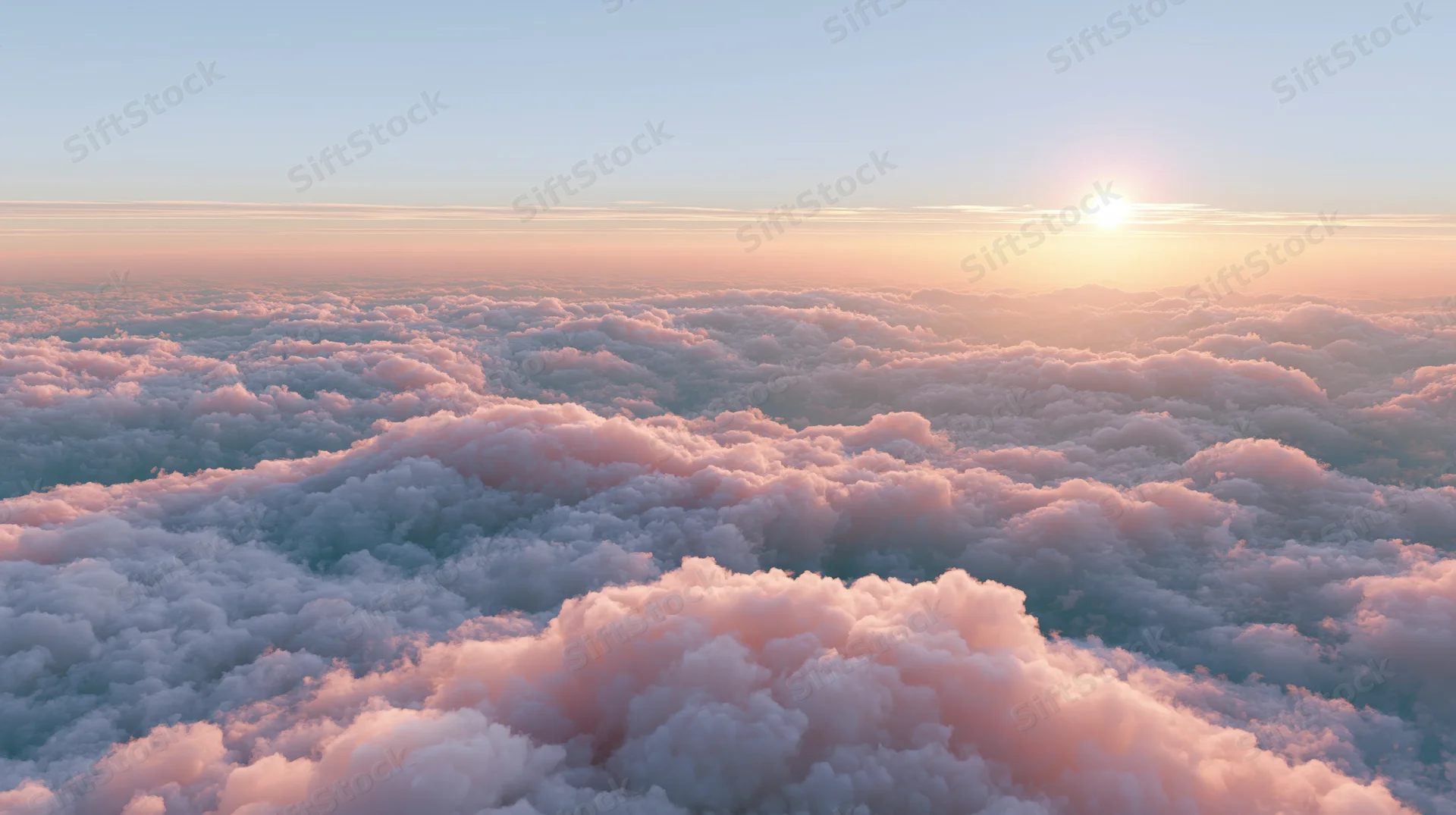 Aerial view of soft cumulus clouds at sunset above the horizon
