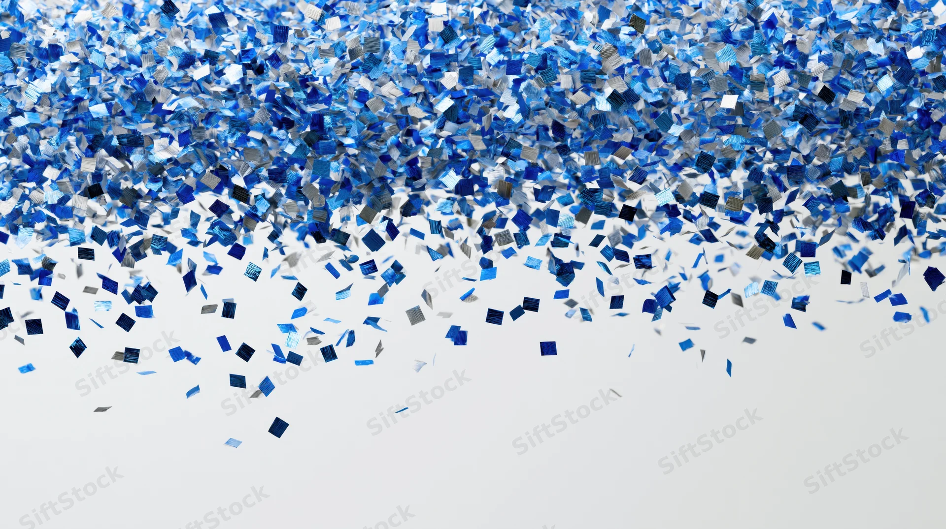Blue metallic confetti pieces falling and scattering midair against white background
