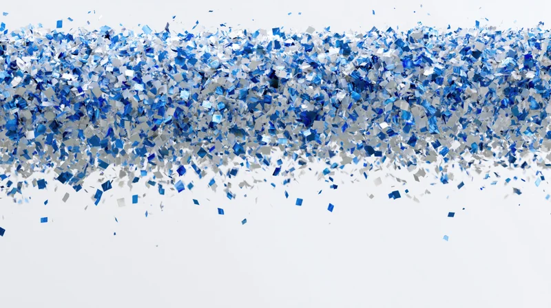Blue metallic confetti falling and scattering midair against white background