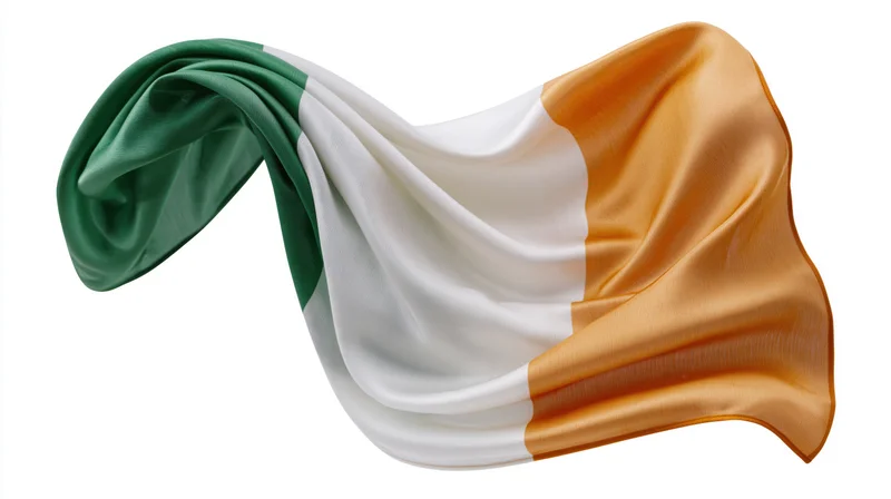 Irish tricolor flag flowing as silk fabric against white background