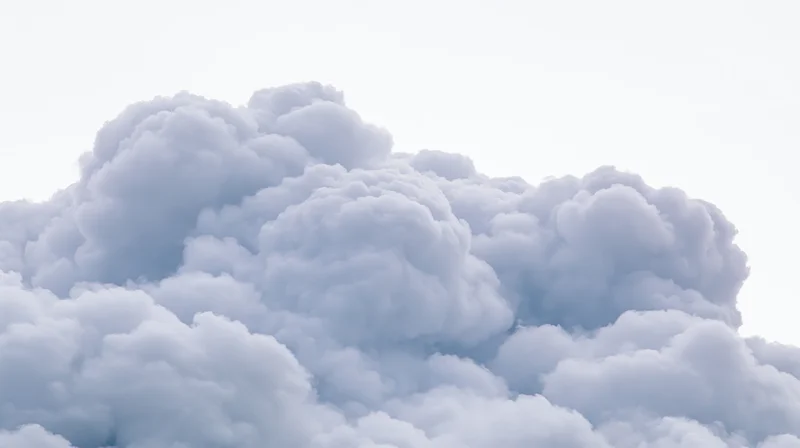 Large cumulus cloud formation billowing upward in the sky