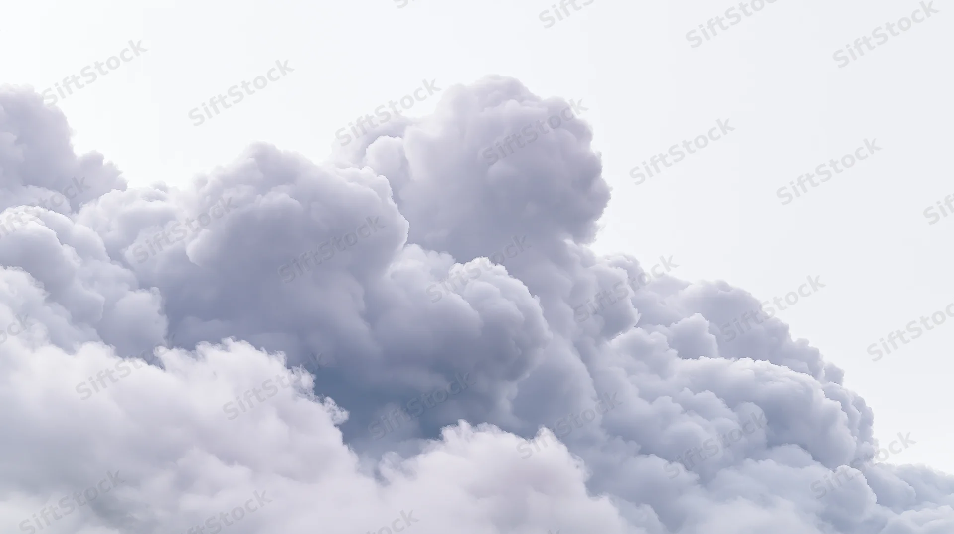 Large cumulus cloud formation billowing upward in the sky
