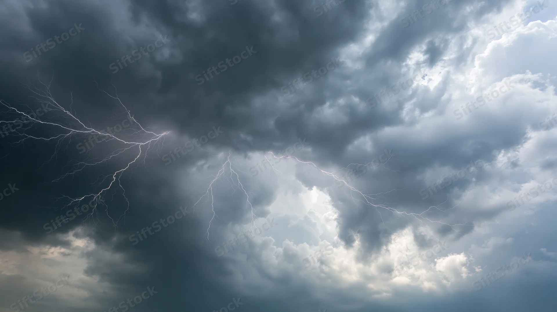 Lightning bolts branching across a turbulent storm sky