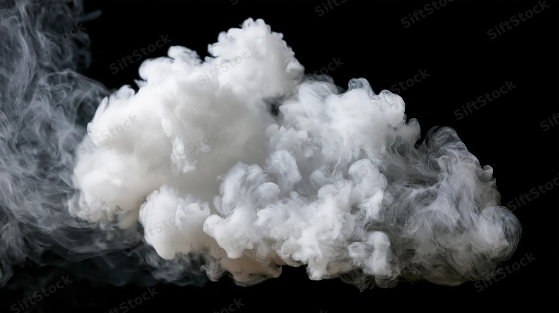 White smoke drifting and curling mid-air against a pure black background