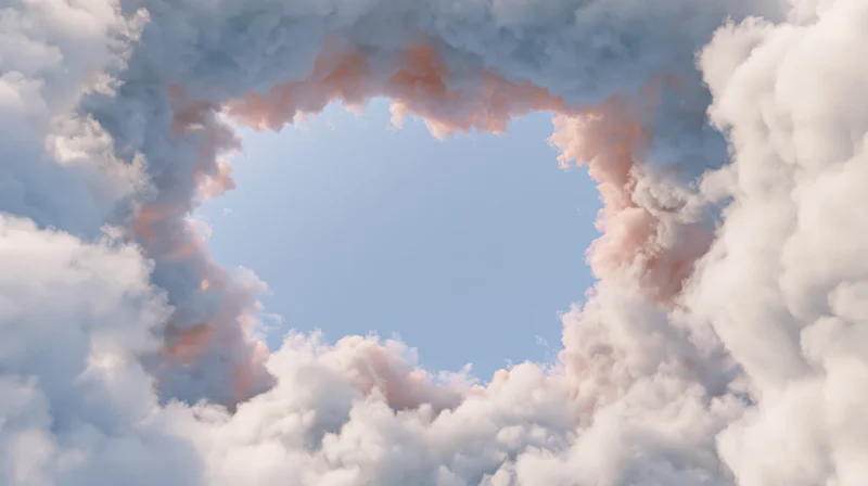 Heart-shaped cloud formation in the sky viewed from below with blue clearing in center