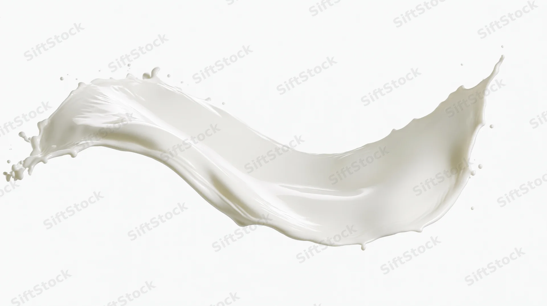 Milk splash frozen in mid-air forming a curved wave against white background