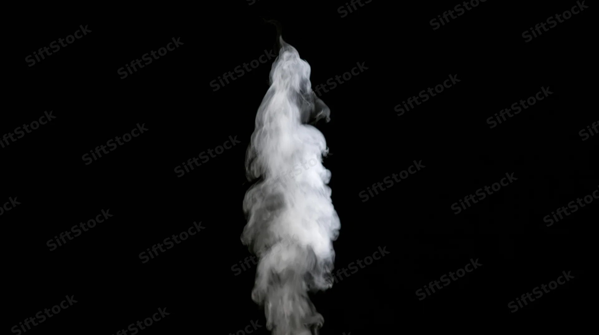 Rising plume of white smoke drifting upward against black background