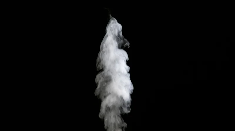 Rising plume of white smoke drifting upward against black background