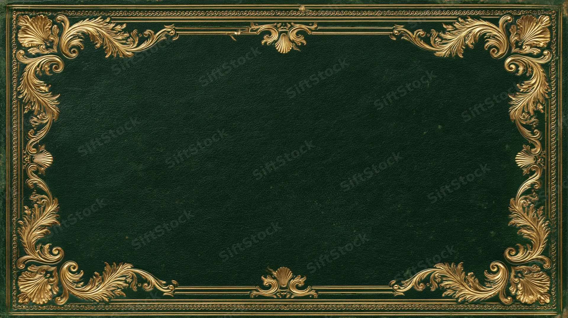 Antique book cover with ornate gold embossed border on deep green leather surface