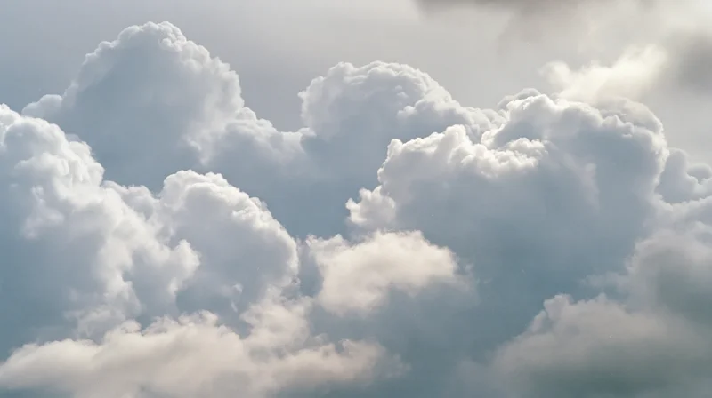 Large cumulus clouds billowing across the sky filling the frame
