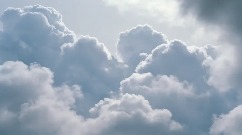 Large cumulus clouds billowing across the sky filling the frame