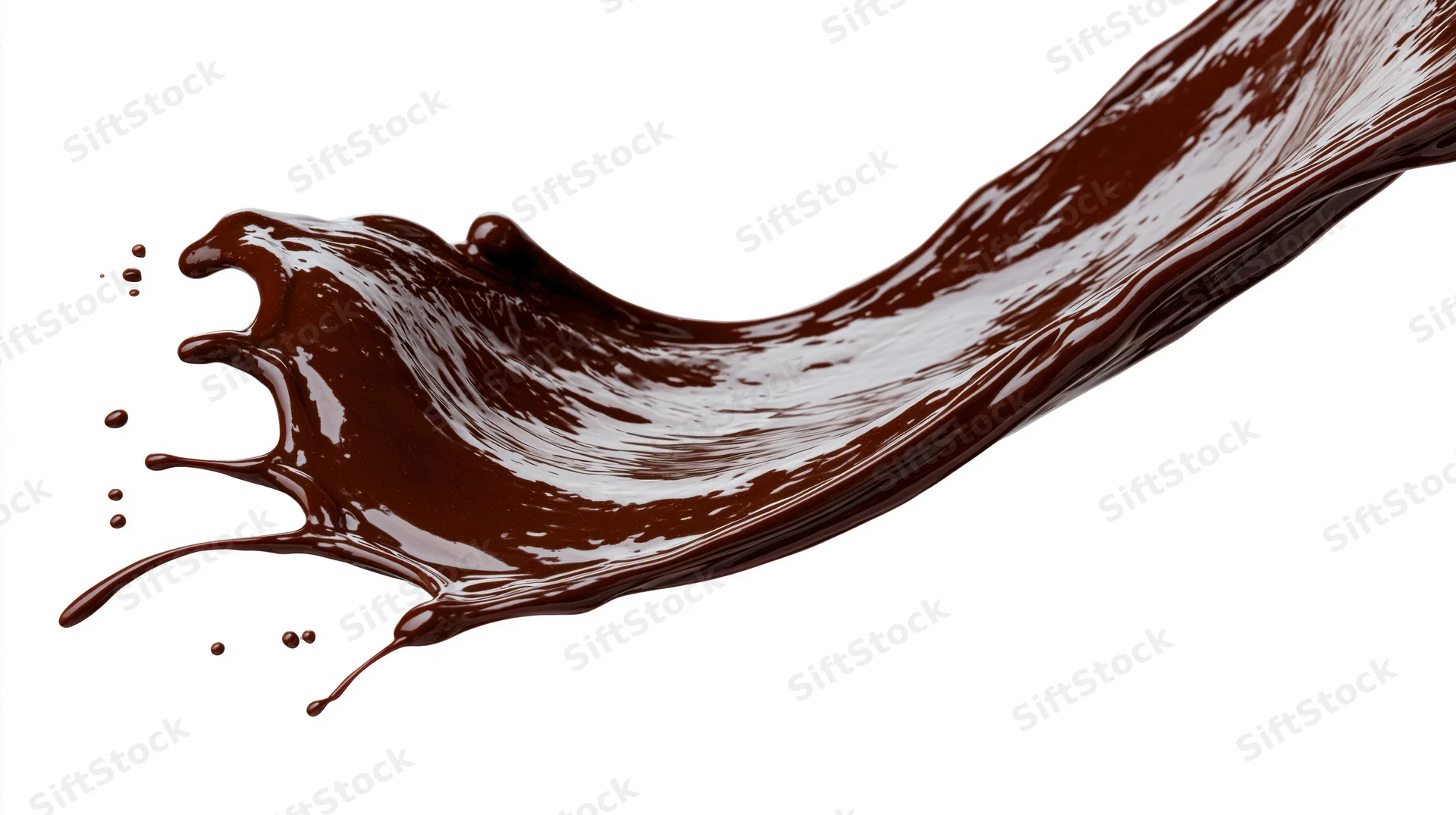 Dark chocolate liquid splashing in mid-air against white background