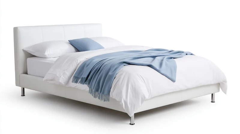 Modern double bed with white upholstered frame and chrome legs, dressed with white bedding and blue throw blanket, isolated on white background